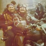 Oakland Hells Angels Boomer with Willie Nelson riding behind him.